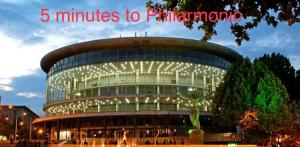 a building with lights on it with the words minutes to palacio at Hotel type rooms on avenue Melikishvili, city center in Tbilisi City
