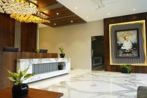 Vstupní hala nebo recepce v ubytování Alaukik Hotel