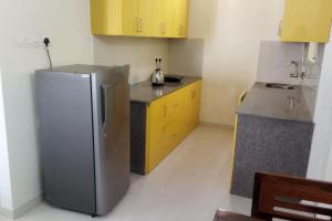 TATA Rio De Goa ,Goodstay 2 BHK Apartment With Pool ,6km from Airport ,201的厨房或小厨房
