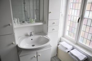 Kylpyhuone majoituspaikassa Hotel Het Anker
