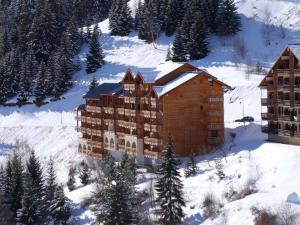Το Triplex confort à 400m des pistes, 3 niveaux, 2 chambres, casier à skis, parking gratuit, Auris en Oisans - FR-1-297-66 τον χειμώνα