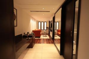 Postel nebo postele na pokoji v ubytování Hotel Cenneys Gateway
