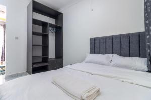 Ένα ή περισσότερα κρεβάτια σε δωμάτιο στο Spad House Furnished Apartment & Spa