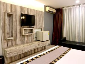 TV a/nebo společenská místnost v ubytování Swana Bangkok Hotel