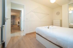A bed or beds in a room at Monte Aurora