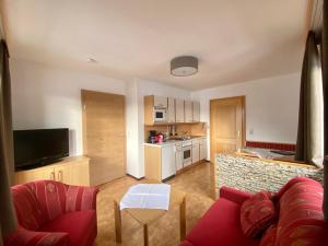 Kuchyň nebo kuchyňský kout v ubytování Appartement Hubner