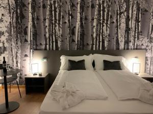 Voodi või voodid majutusasutuse Guest House Le Cassandre toas