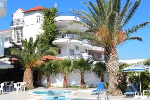 a view of the hotel from the pool at Elarin studios & apartments in Faliraki
