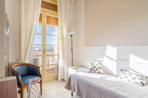Posteľ alebo postele v izbe v ubytovaní Casa di Alice