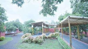 Zahrada ubytování Amraness Luxury Resort Sasan Gir
