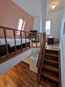 Postel nebo postele na pokoji v ubytování Hotel Marasesti