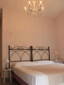Postel nebo postele na pokoji v ubytování Hotel B&B Francesca