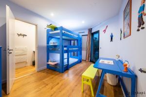 Posteľ alebo postele v izbe v ubytovaní Villa Eskapi Perpignan