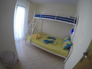 Posteľ alebo postele v izbe v ubytovaní Dimi Apartments