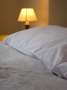 Cama ou camas em um quarto em Il Palazzetto