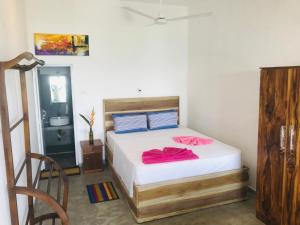 Postel nebo postele na pokoji v ubytování fantasea villa