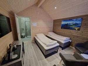 TV a/nebo společenská místnost v ubytování Lofoten Basecamp