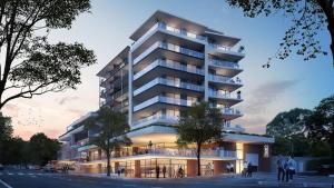 un gran edificio con gente parada frente a él en TheRestInn @ 2Six2 Florida, en Durban