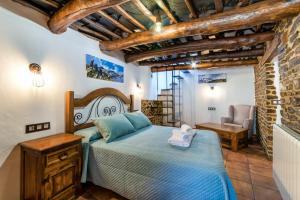 Postel nebo postele na pokoji v ubytování Casa Antonia Capileira La Alpujarra