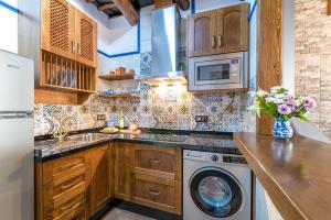 Kuchyň nebo kuchyňský kout v ubytování Casa Antonia Capileira La Alpujarra