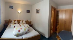 Postel nebo postele na pokoji v ubytování Apart Claudia - Ski-in and Ski-out