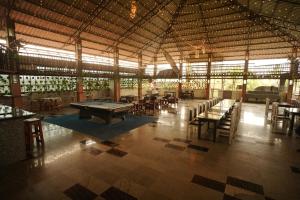 a large building with a pool table in it at AQUARIA THE BOUTIQUE RESORT in Cochin