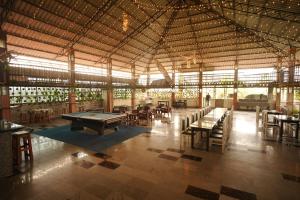 a large building with a pool table in it at AQUARIA THE BOUTIQUE RESORT in Cochin