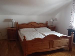 Postel nebo postele na pokoji v ubytování Hinterramsebn