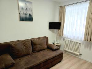 Posezení v ubytování Apartment Steirawohnzimmer
