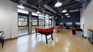 a room with a ping pong table in it at Twerton Mill in Bath 7 Min Bus to City Centre in Bath