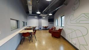 a room with chairs and tables in a building at Twerton Mill in Bath 7 Min Bus to City Centre in Bath +53 photos