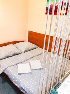 Łóżko lub łóżka w pokoju w obiekcie Apartaments Piotrkowska 101