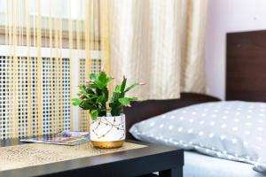 Łóżko lub łóżka w pokoju w obiekcie Apartaments Piotrkowska 101