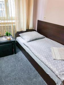 Łóżko lub łóżka w pokoju w obiekcie Apartaments Piotrkowska 101