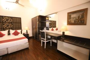 Postel nebo postele na pokoji v ubytování Hotel Capitol Hills - Greater Kailash Delhi