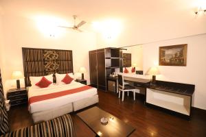 Postel nebo postele na pokoji v ubytování Hotel Capitol Hills - Greater Kailash Delhi + 37 fotografií