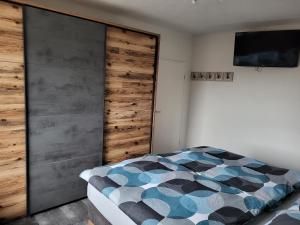 Postel nebo postele na pokoji v ubytování Apartment Karin, Eigener Eingang, 3 Schlafzimmer, Doppelcarport