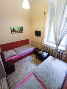 Łóżko lub łóżka w pokoju w obiekcie Apartaments Piotrkowska 101