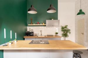 Kuchyňa alebo kuchynka v ubytovaní D63 Dohány Apartment