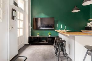 Televízia a/alebo spoločenská miestnosť v ubytovaní D63 Dohány Apartment