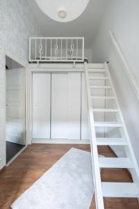 Posteľ alebo postele v izbe v ubytovaní D63 Dohány Apartment