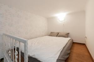 Posteľ alebo postele v izbe v ubytovaní D63 Dohány Apartment