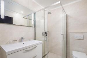 Koupelna v ubytování Le Premier Luxury Rooms