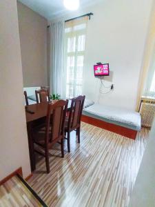 Łóżko lub łóżka w pokoju w obiekcie Apartaments Piotrkowska 101