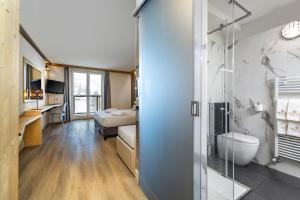 Postel nebo postele na pokoji v ubytování Hotel Piandineve
