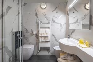 Koupelna v ubytování Hotel Piandineve