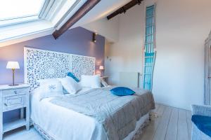 Postel nebo postele na pokoji v ubytování B&B Yasmine Brugge