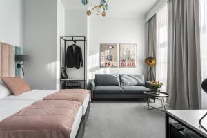 Posteľ alebo postele v izbe v ubytovaní Old Town Residence Aparthotel