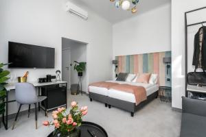 Posteľ alebo postele v izbe v ubytovaní Old Town Residence Aparthotel