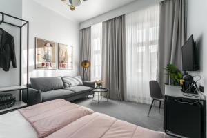 Posteľ alebo postele v izbe v ubytovaní Old Town Residence Aparthotel